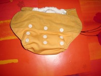 couche grovia orange et son pad original